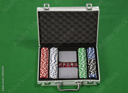Photo: A photo of poker chips and cards in a briefcase A photo of poker chips and cards in a briefcase