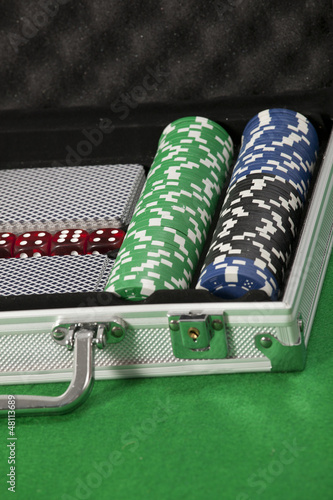 Photo: A photo of poker chips and cards in a briefcase A photo of poker chips and cards in a briefcase