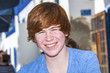 outdoor portrait of relaxed cute young boy