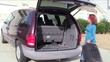 Packing Luggage into Van