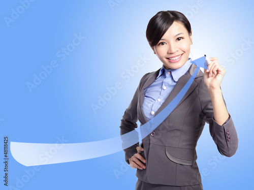Photo: success business woman draw arrow success business woman draw arrow