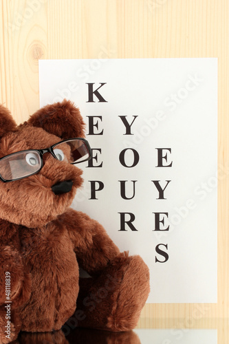 Photo: Eyesight test chart with glasses and with toy Eyesight test chart with glasses and with toy