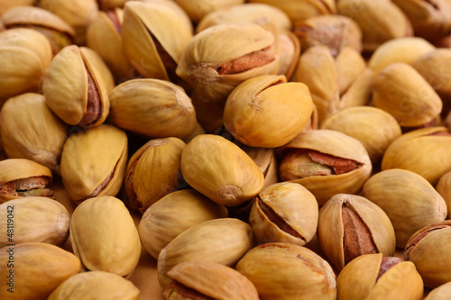 Photo: tasty pistachio nuts, close up tasty pistachio nuts, close up
