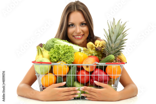 Photo: beautiful young woman with fruits and vegetables in shopping beautiful young woman with fruits and vegetables in shopping