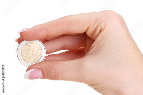 Photo: Woman hand with euro coin, isolated on white Woman hand with euro coin, isolated on white