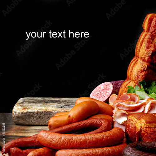 Photo: smoked meat and sausages smoked meat and sausages