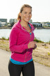 Happy woman jogger training in the park. Healthy lifestyle and p