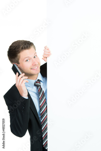 Photo: geschäftsmann mit telefon und werbetafel geschäftsmann mit telefon und werbetafel
