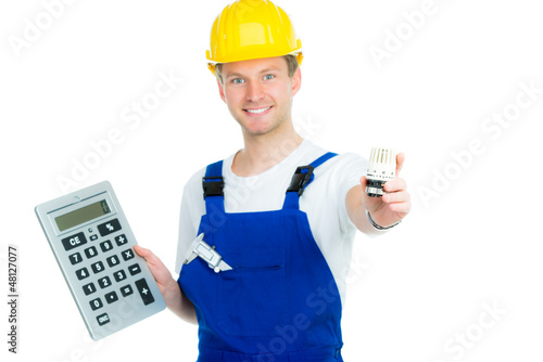 Photo: handwerker kalkuliert heizkosten handwerker kalkuliert heizkosten