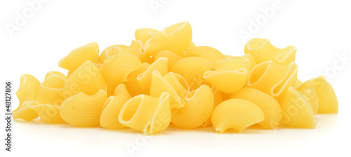 Photo: Lumache pasta from side isolated on white background Lumache pasta from side isolated on white background
