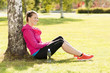 Happy woman jogger training in the park. Healthy lifestyle and p