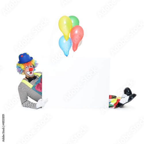 Photo: Clown mit Werbeschild Clown mit Werbeschild