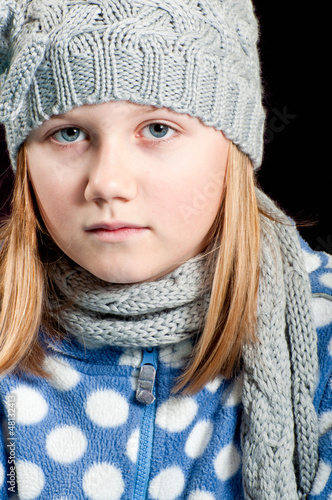 Photo: Girl in winter clothes Girl in winter clothes