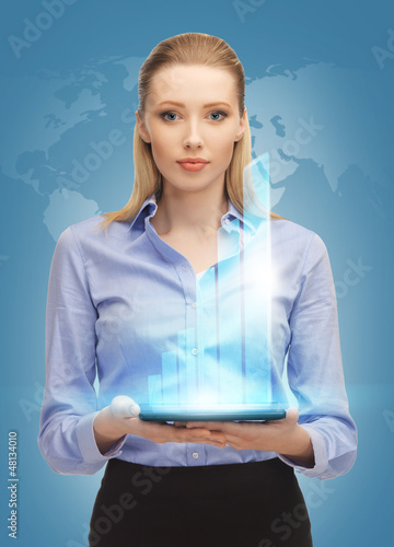 Photo: woman with tablet pc woman with tablet pc