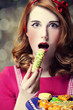 Redhead women with cookies