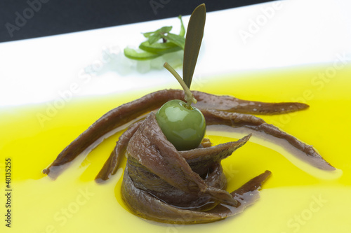 Photo: anchovies in oil whith olives tapa anchovies in oil whith olives tapa