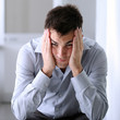 Foto: Man in home office with thoughtful look Man in home office with thoughtful look