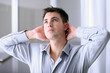 Man in home office with thoughtful look