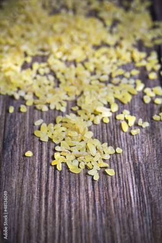 Photo: Tabulè on a wooden background Tabulè on a wooden background