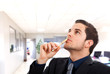 Photo: Thoughtful businessman in his office Thoughtful businessman in his office