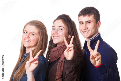 Photo: Teenage Students Making Victory or Peace Sign Teenage Students Making Victory or Peace Sign