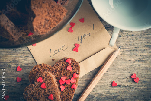 Photo: Card with Message Love You and Chocolate Cookies in the Shape of Card with Message Love You and Chocolate Cookies in the Shape of