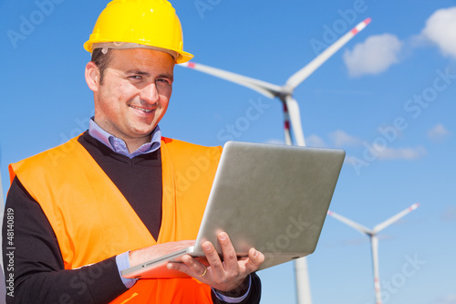 Photo: Technician Engineer in Wind Turbine Power Generator Station Technician Engineer in Wind Turbine Power Generator Station