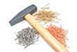 wooden hammer and different nails on white