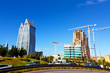Modern futuristic buildings construction and blue sky
