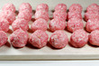 Fresh uncooked meatballs