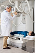 Radiologist Ready To Take X-ray Of Patient