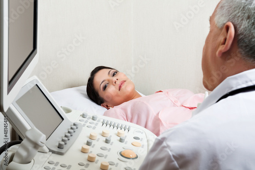 Photo: Female For Ultrasound Check Up At Clinic Female For Ultrasound Check Up At Clinic