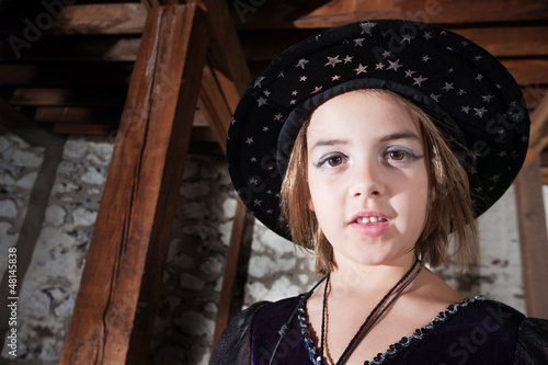 Photo: Young Witch in Hat Young Witch in Hat