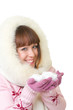 Foto: Beautiful smiling girl in warm clothes with snow Beautiful smiling girl in warm clothes with snow