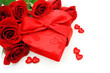 Heart shaped Valentines Day gift box with red roses over white