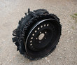 damaged tire after tire explosion at high speed on highway