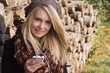 Smiling Pretty Girl with Smartphone
