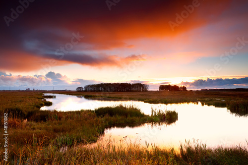 Photo: dramatic sunrise over lake dramatic sunrise over lake