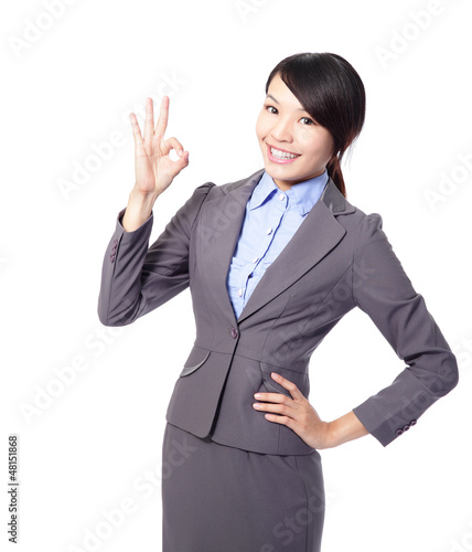 Photo: Perfect - business woman showing OK hand sign Perfect - business woman showing OK hand sign