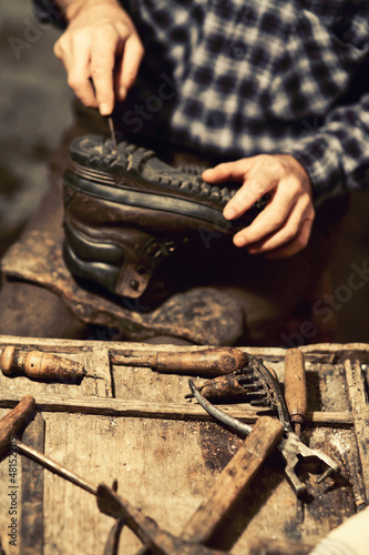 Photo: cobbler at work cobbler at work