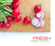 Fresh radish on a wooden board on white background