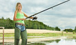 Photo: woman fishing at pond woman fishing at pond