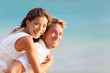 Multiracial people: Happy couple piggyback