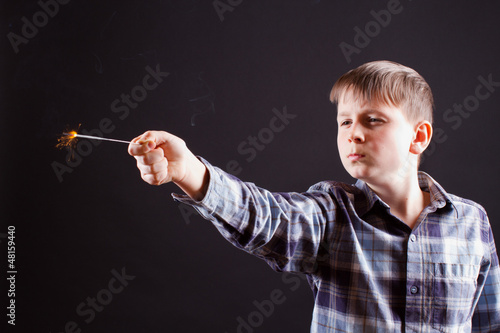 Photo: boy with sparklers boy with sparklers