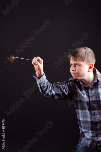 Photo: boy with sparklers boy with sparklers