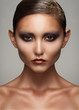 Foto: Woman with creative makeup Woman with creative makeup