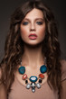 Foto: Woman with beautiful necklace Woman with beautiful necklace