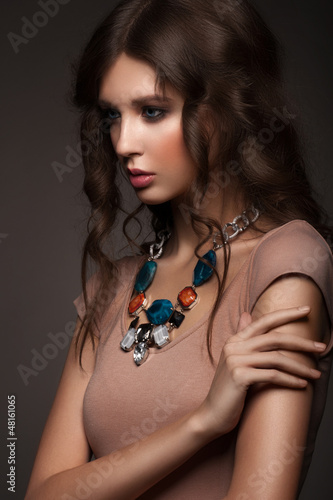 Photo: Woman with beautiful necklace Woman with beautiful necklace