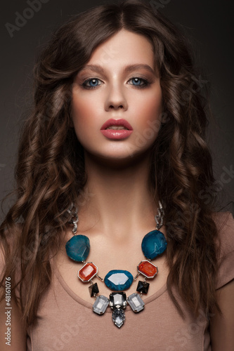 Photo: Woman with beautiful necklace Woman with beautiful necklace