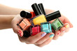 woman hands with nail polishes isolated on white